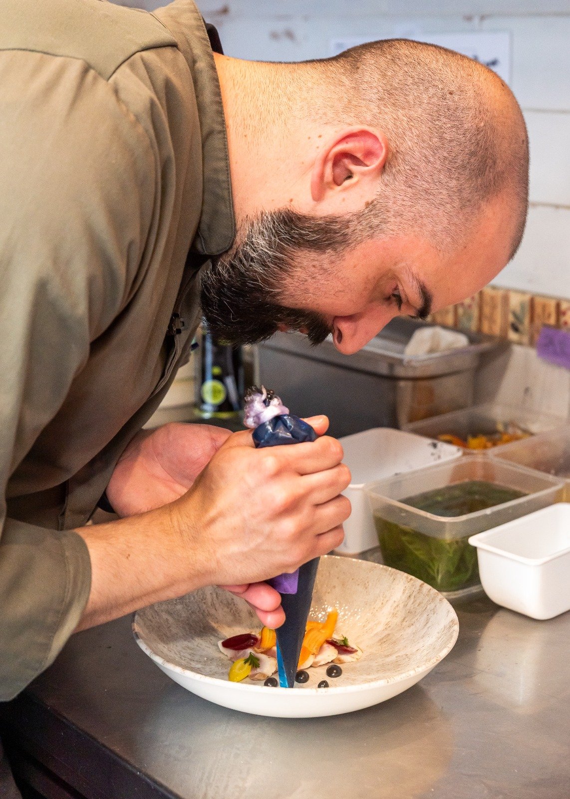 Villa Coucou Chef plating food carefully
